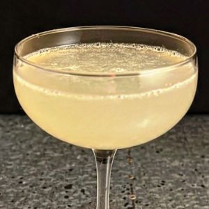An image of the Airmail cocktail submitted by n0tquitethere that contains Gold Rum, Lime, Honey Syrup and Champagne