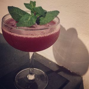 An image of the Amelia cocktail submitted by n0tquitethere that contains Plain Vodka, St Germain, Blackberries, Simple Syrup, Lemon and Mint