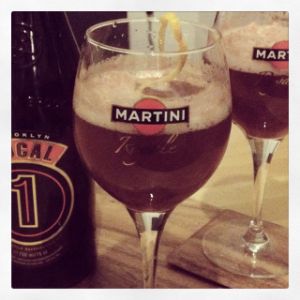 An image of the Beer Cassis cocktail submitted by n0tquitethere that contains Dubonnet Rouge, Crème de Cassis, Belgian Strong Golden Ale and Lemon