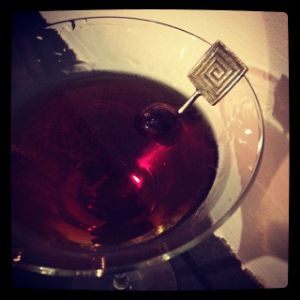 An image of the Black Hawk cocktail submitted by n0tquitethere that contains Rye Whiskey, Sloe Gin and Cocktail Cherry
