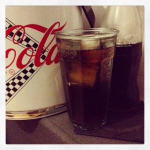 An image of the Cinema Highball cocktail submitted by n0tquitethere that contains Homemade Popcorn Rum and Coca-Cola