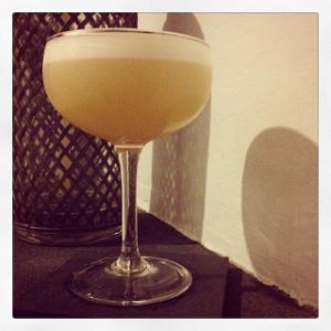 An image of the Conquistador cocktail submitted by n0tquitethere that contains Gold Rum, Blanco Tequila, Simple Syrup, Lemon, Lime, Orange Bitters and Egg