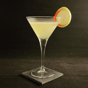An image of the Harvest Pear cocktail submitted by n0tquitethere that contains Dry Riesling, Pear Brandy, Amaretto, Lemon, Simple Syrup and Pear
