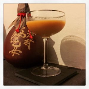 An image of the Japanese Cocktail cocktail submitted by n0tquitethere that contains Cognac, Orgeat Syrup, Angostura Bitters and Lemon