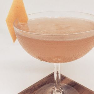 An image of the Jasmine cocktail submitted by n0tquitethere that contains London Dry Gin, Curaçao Triple Sec, Lemon, Turin Bitters and Grapefruit