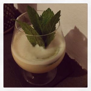 An image of the Kentucky Island cocktail submitted by n0tquitethere that contains Rye Whiskey, Pineapple Juice, Orgeat Syrup, Lemon, Peach Bitters, Lime and Mint