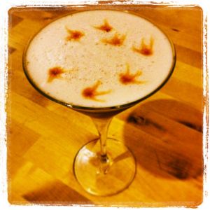 An image of the Lion Tamer cocktail submitted by n0tquitethere that contains Plain Vodka, Lime, St Germain, Crème de Cassis, Egg and Angostura Bitters