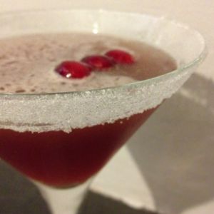An image of the Metropolitan cocktail submitted by n0tquitethere that contains Lemon Vodka, Crème de Framboise, Cranberry Juice, Orange, Lemon, Caster Sugar and Cranberries