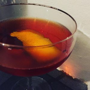An image of the Neisson Negroni cocktail submitted by n0tquitethere that contains Agricole Rhum, Turin Bitters, Sweet Vermouth, Xocolatl Mole Bitters and Orange