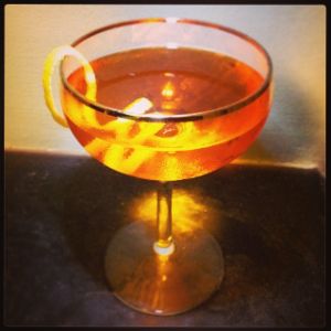 An image of the Paper Trail cocktail submitted by n0tquitethere that contains Bourbon, Aperol, Suze and Grapefruit