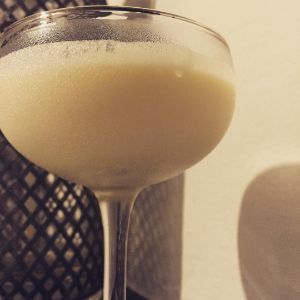 An image of the Parisian Blond cocktail submitted by n0tquitethere that contains Gold Rum, Curaçao Triple Sec, Cream and Vanilla Extract