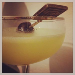 An image of the Pete's Word cocktail submitted by n0tquitethere that contains Single Malt Scotch, Green Chartreuse, Lime, Maraschino Liqueur and Cocktail Cherry