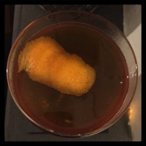 An image of the The Smoking Gun cocktail submitted by n0tquitethere that contains Amaro Ciociaro Liqueur, Rye Whiskey, Lapsong Souchang Syrup, Xocolatl Mole Bitters, Angostura Bitters and Orange