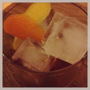 An image of the The Conference cocktail submitted by n0tquitethere that contains Demerara Syrup, Rye Whiskey, Bourbon, Cognac, Apple Brandy, Angostura Bitters, Xocolatl Mole Bitters, Orange and Lemon