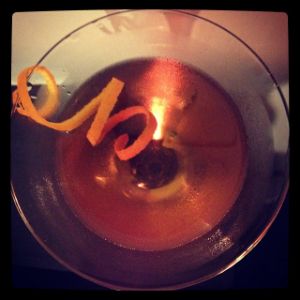 An image of the The Corsican cocktail submitted by n0tquitethere that contains Bourbon, Gold Rum, Falernum, Sweet Vermouth, Orange Bitters and Orange