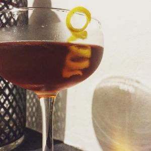 An image of the Up To Date cocktail submitted by n0tquitethere that contains Rye Whiskey, Manzanilla Sherry, Grand Marnier, Angostura Bitters and Lemon