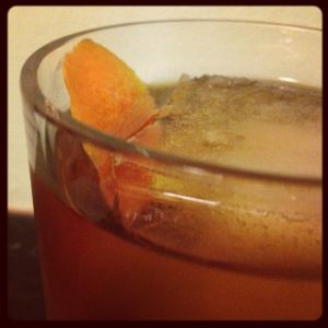 An image of the Windsor Knot cocktail submitted by n0tquitethere that contains Cognac, Rye Whiskey, Dry Vermouth, Cynar, Benedictine DOM and Orange